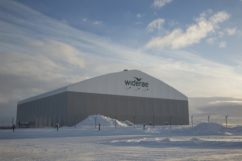 Thermally insulated Champion Door hangar doors for Widerøe in Norway