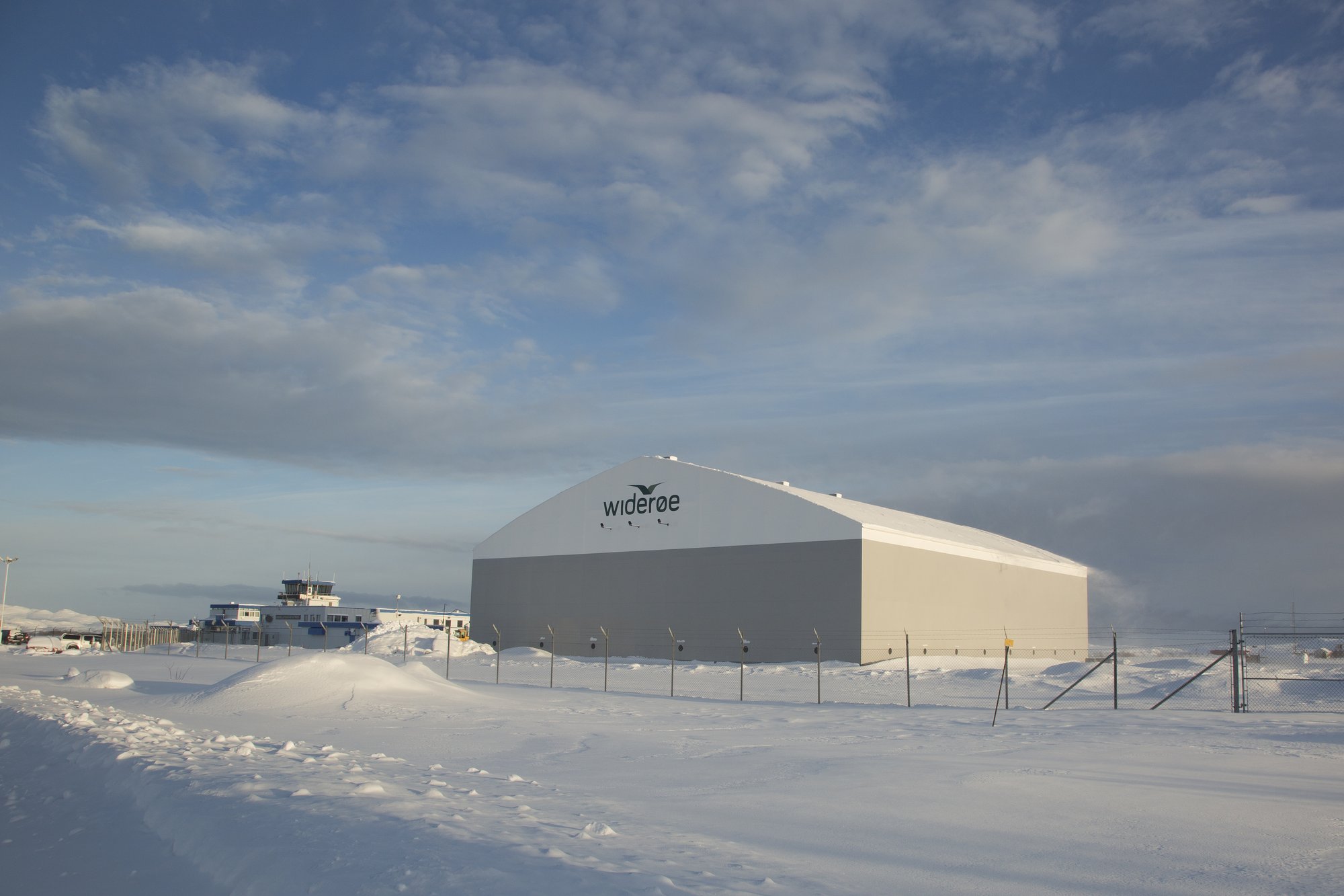 snow cold weather climate large door hangar door arctic conditions