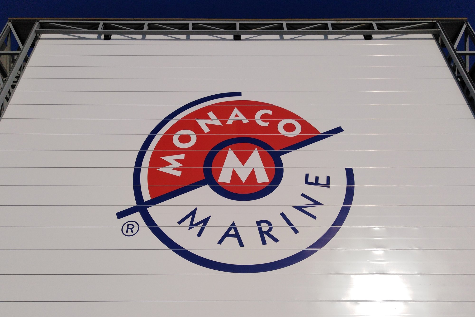 Champion Door custom logo monaco marine shipyard door