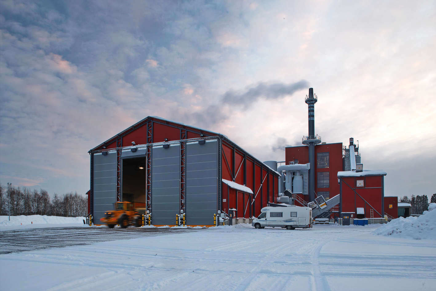 Industrial doors in wood chip storage